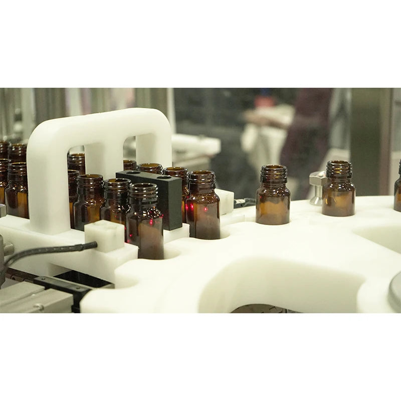 Automatic syrup bottle filler and capper filling capping and labeling machine for liquid