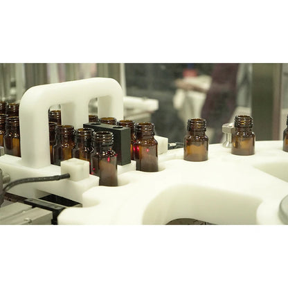 Automatic syrup bottle filler and capper filling capping and labeling machine for liquid