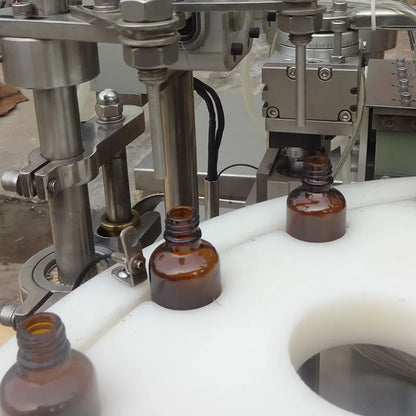 Full production line filling machine essential oils roll on glass perfume essential oil bottle liquid filling capping machine