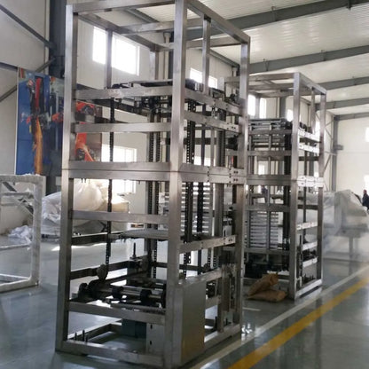 Continuous Vertical Transfer Conveyor System For Cartons, Bags, Pallet